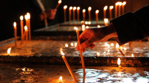 Lighting candles for the dead